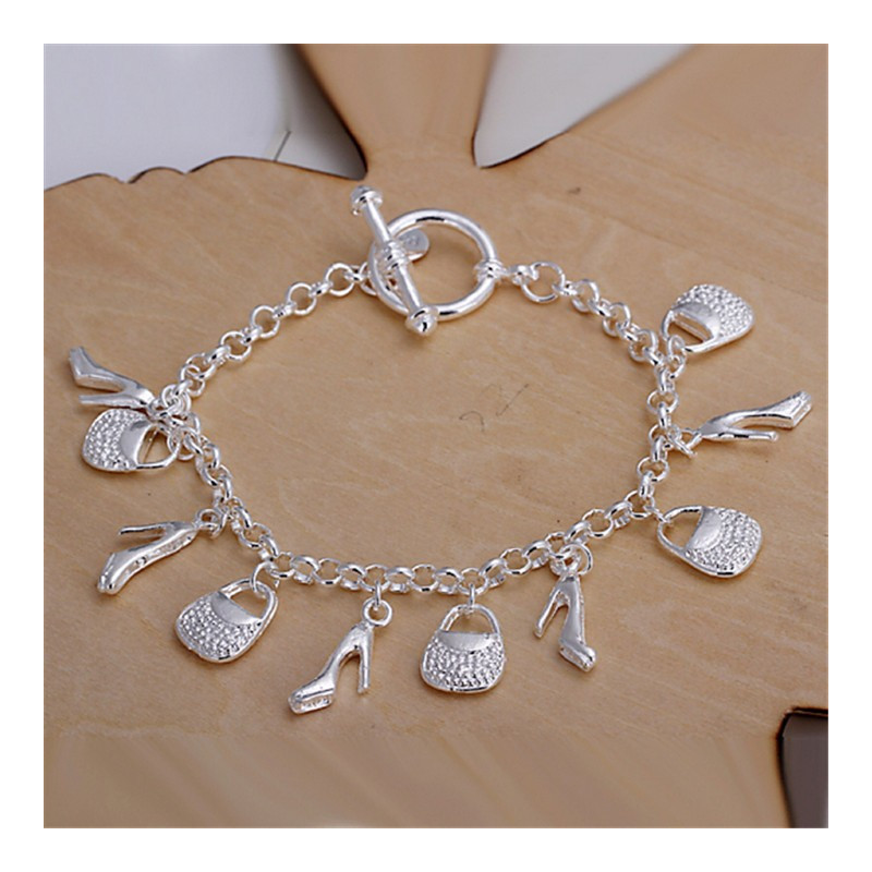 Vakre armbånd sko og taske av høy kvalitet