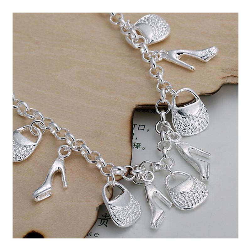 Vakre armbånd sko og veske av høy kvalitet